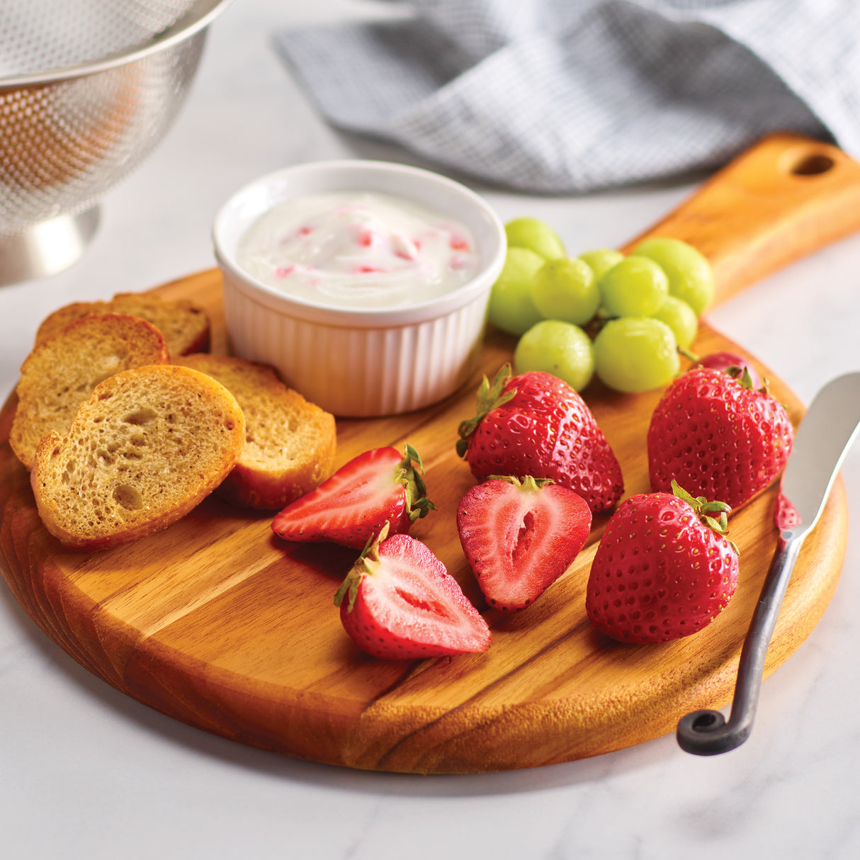 13.25 Inch x 9 Inch Teak Wood Round Cutting Board with Handle