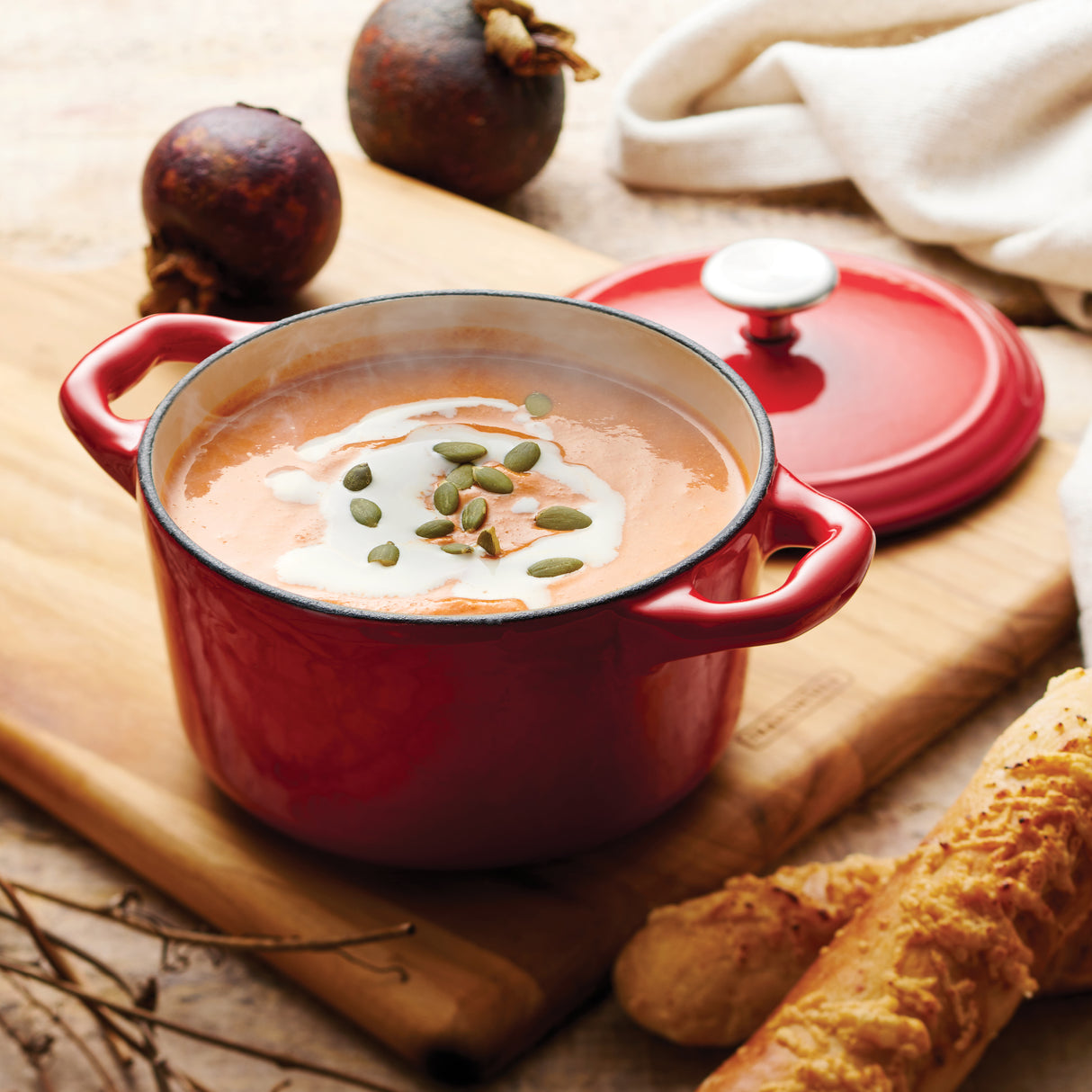 Bestow 24 oz Enameled Cast-Iron Covered Small Cocotte - Gradated Red