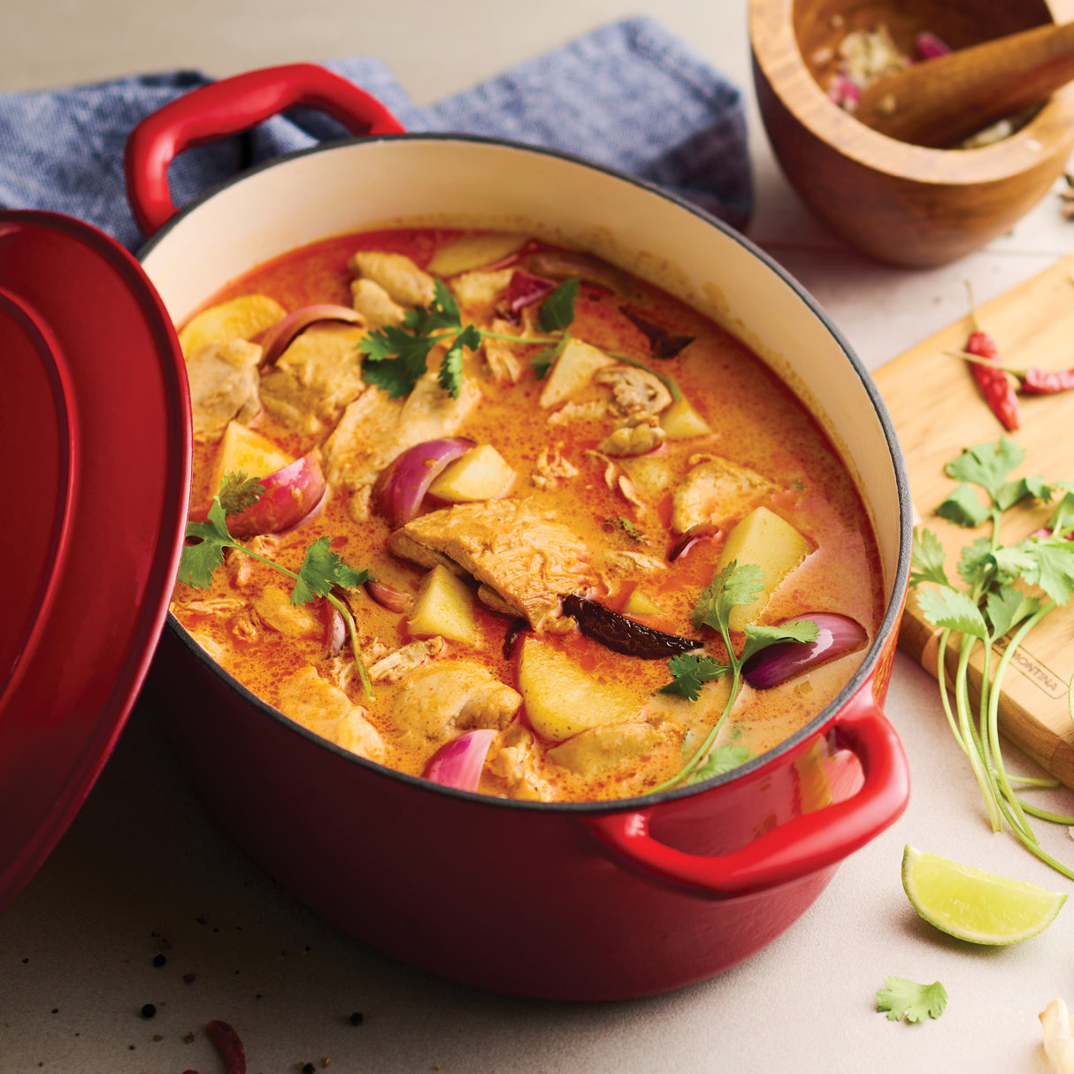 Bestow 7 Qt Enameled Cast-Iron Covered Oval Dutch Oven - Gradated Red