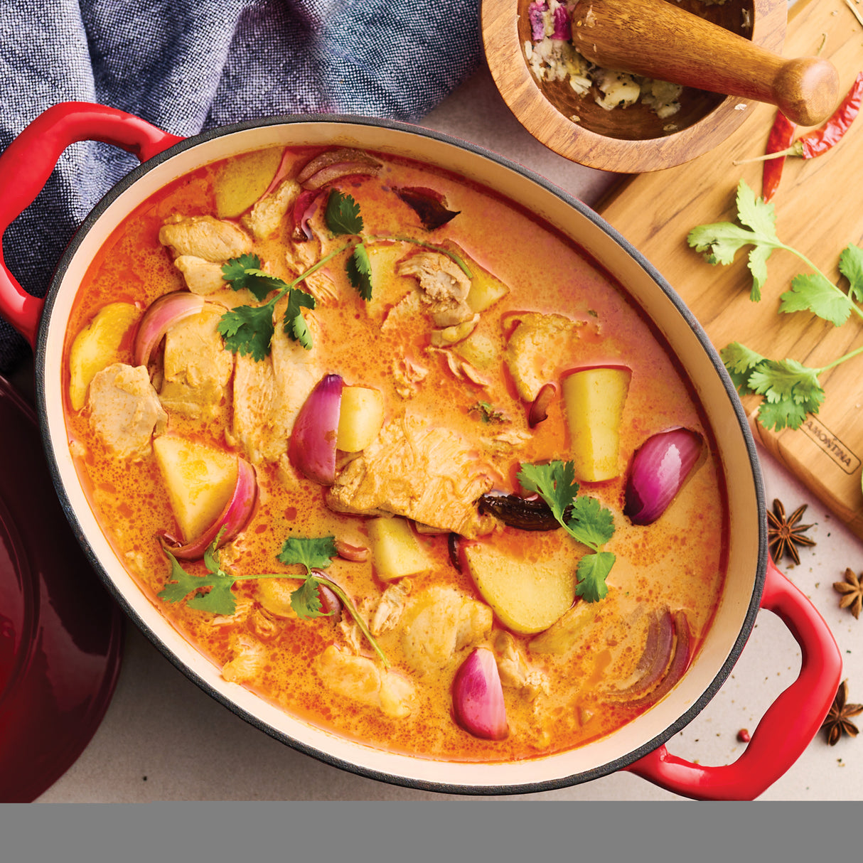 Bestow 7 Qt Enameled Cast-Iron Covered Oval Dutch Oven - Gradated Red