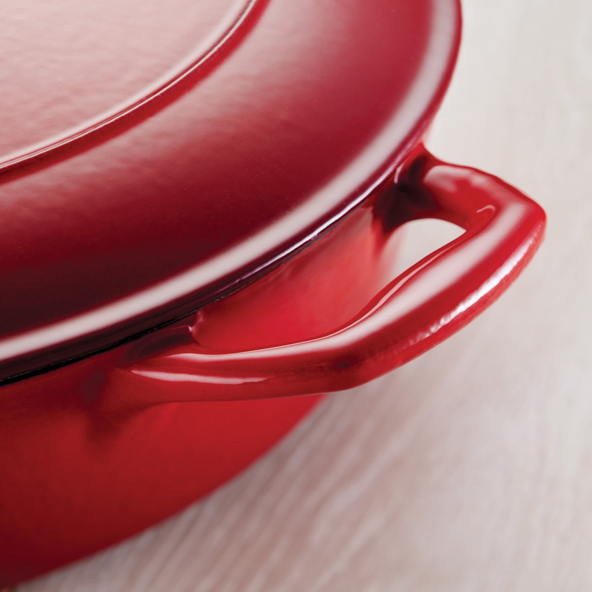 Bestow 7 Qt Enameled Cast-Iron Covered Oval Dutch Oven - Gradated Red