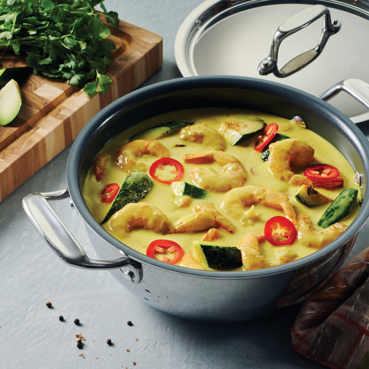 Utsava Tri-Ply Clad Covered Kadai with Ceramic Interior